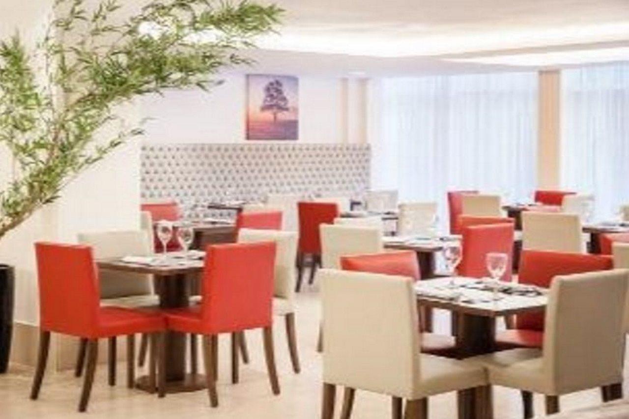 Ramada Hotel & Suites Campos Pelinca Кампус-дус-Гойтаказіс Екстер'єр фото